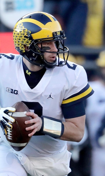 Patterson throws 3 TDs, No. 4 Michigan beats Rutgers 42-7